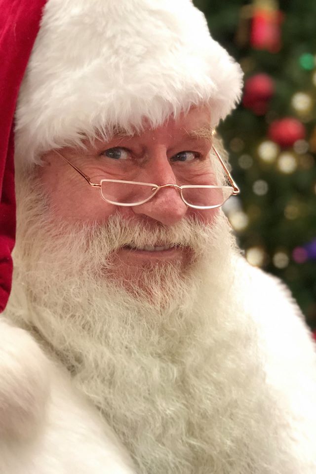 Professional real bearded Santa Claus with children for ImSanta reviews