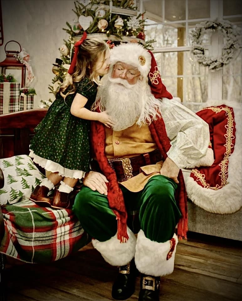 Professional Santa Claus performer appearing at a holiday event through ImSanta