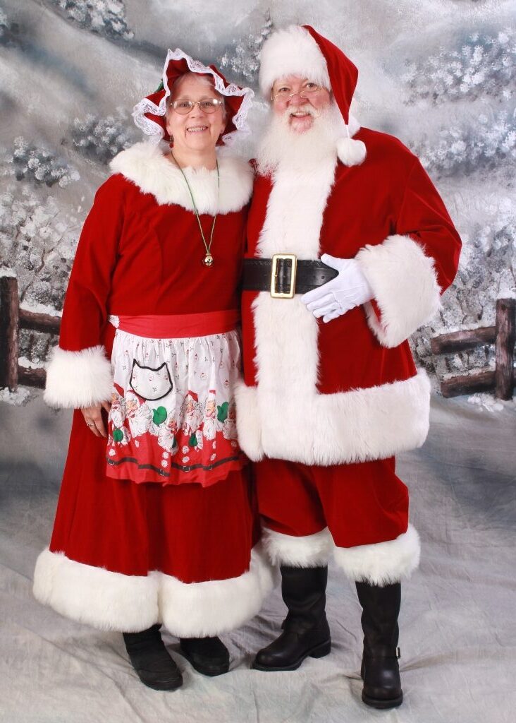 Professional Santa Claus and Mrs Claus full portrait for ImSanta holiday booking