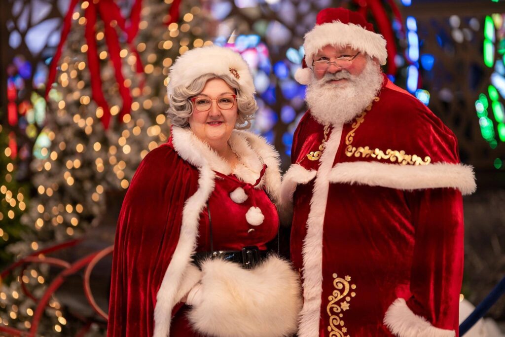 Professional Santa Claus and Mrs Claus at a holiday event for ImSanta testimonials