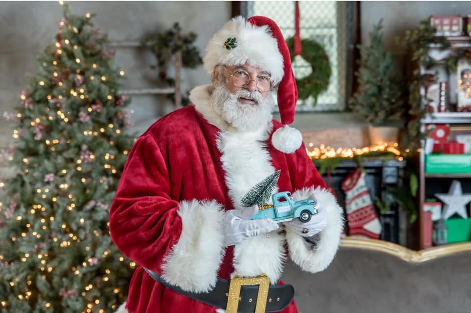 Hire Santa in Denver CO for polished holiday photo sets retail appearances and festive event bookings